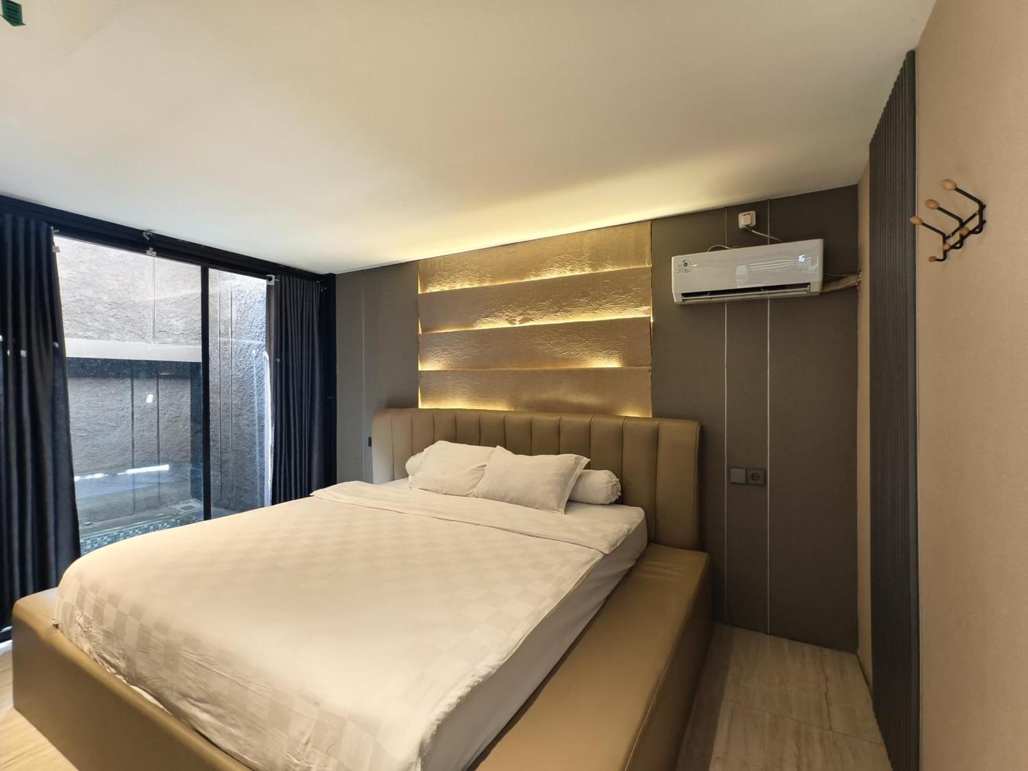 Kamar Deluxe (2 Dewasa + 1 Anak-anak)